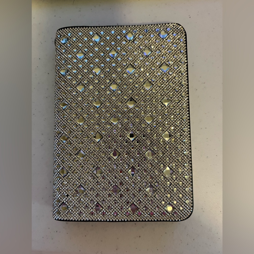 Jacqueline Kent silver notebook sleeve with notebook included. New in bag